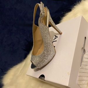 Elegant silver peep toe heels